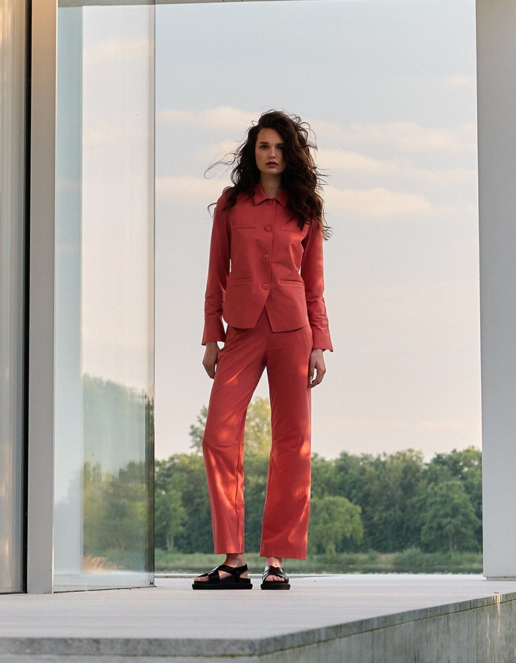 Woman wearing pink Japan TKY suit from the SPring Summer 2025 collection